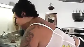 Inked BBW dominates and pegs slave's hole with a thick dildo