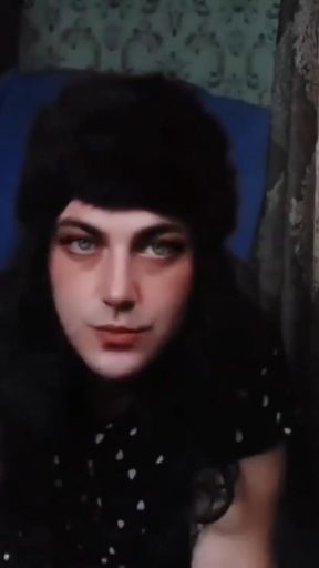 Memorable moment from "Cute sissy brushing long pastel-colored wig gently"