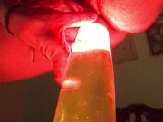 Girl slides her pussy over hot lava lamp