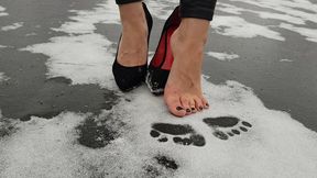 high heels on ice, high heels in snow, barefoot on ice, sliding heels, shoes on snow
