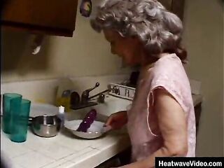 Dirty granny with grey-hair sucks off the ebony plumber