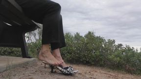 Shoeplay and Dangling in chequered mid heel Mules outdoor