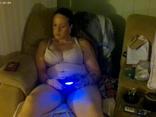 Step Mommy smokin' and playing movie scene games in her brassiere and pants