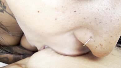 Her split tongue slurps her pierced nipples raw