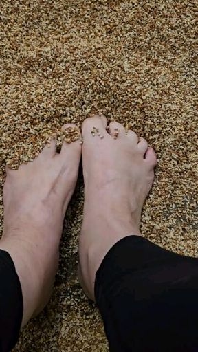 Feet in Fake Gravel