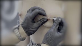 Sexy Wife Piercing Her Nipples In A Piercing Studio. Close Up