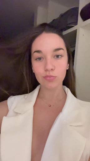 Big-titted cutie shows off her assets
