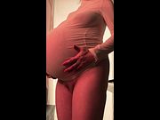 Hugely pregnant MILF Lily Corinth dances on day of labour, rubs her wet pussy and gets fingered