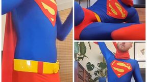 A horny superman jerks his cock in his spandex and speedo