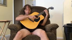 Nude Hairy Stud Guitar Playing