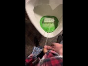 Pissing into a urinal in a pub. I play football with urine
