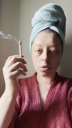 Relaxing smoker takes a break for some cock sucking