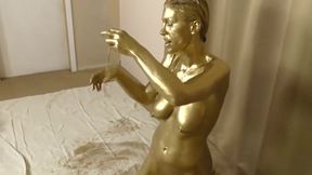 Milf Goldie Blair Is Turned Into Real Gold Statue