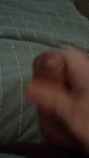My friend's boyfriend is lying in bed jerking his cock while we watch and have an orgasm   Clip 1