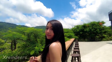 Slender Asian woman rides her tattooed lover to creampie in sunlit room