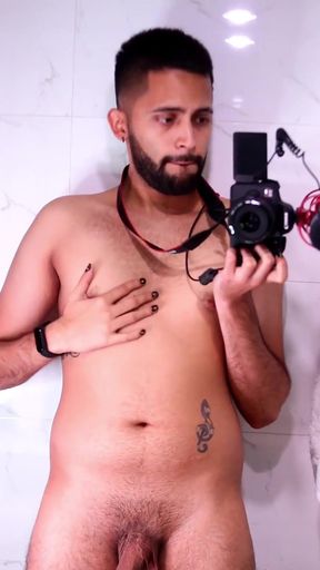 Horny latino stroking his big uncut dick in the mirror until he cums