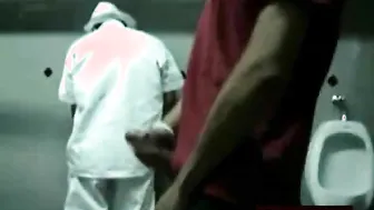 Muscular amateur stroking his big cock in public restroom