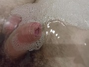 Enjoy pissing inside water with foam. Uncut Close-up cock