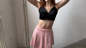 Girl in nylon tights He steps on the fruit with his feet, Her toes are covered with fruit juice