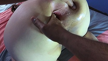 Two balls, a giant dildo and a fist in her ass hole