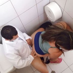 the doctor puts the nurse in the office bathroom and fucks her until she moans with pleasure