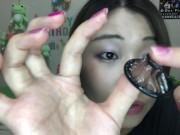 A cute Japanese sex toy shop clerk introduces the latest Japanese condoms