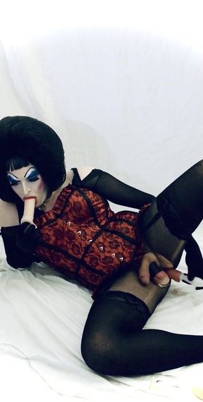 Heavy Makeup Painted Fuck Toy fucks and sucks big dildos