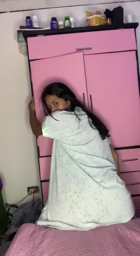 Woman leaning on refrigerator