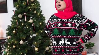 There is nothing like Christmas spirit to spice things up as Arab babe rides a fat co