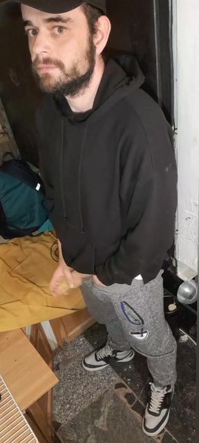 I Masturbate in Sweatpants, a Black Sweatshirt and Nike Sneakers
