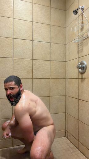 Muscle Cub with Dildo in Gym Showers