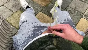 Having a nice warm piss on myself in the backyard