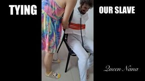 Mistresses Tying Man to Chair - 1080p - Queen Nana and Mistress Poona tie their white slave boy to a chair with Shibari rope and kick him copy
