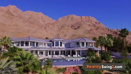 Exclusive couples get together by the pool to play around before the party