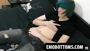 This sexy emo twink with blue hair is masturbating