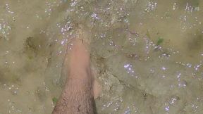 Showing off my feet in the ocean