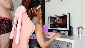 Gamer girl playing LOL while she's fucked doggystyle
