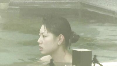 Asian mom is showing her naked body in the hot spa