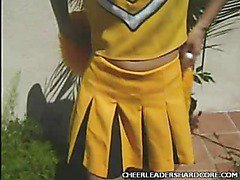 Sexy Cheerleader Spreading her Pussy