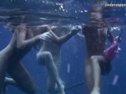Underwater swimming girls on Tenerife