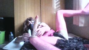 Sissy Crossdresser plays with a continued