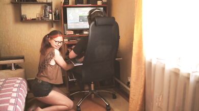 Step sister does handjob for step brother while he plays a computer game