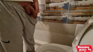 Young gay long pissing at home