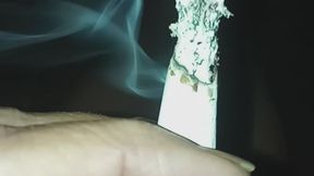 Come sit outside this beautiful evening and have a couple of smokes with me! I burnt my leg a bit on an ash at the end?. I feel like I'm breathing a bit heavy but you only see my legs and feet. Close-ups of cigarettes with tons of smoke. Priced ?