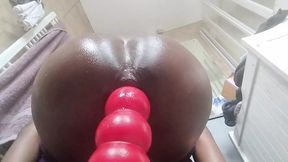 Oiled ass Stretched on Red Dildo