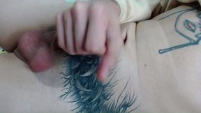 tattooed young man masturbates until he cums