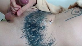 tattooed young man masturbates until he cums