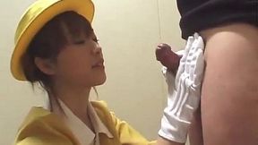 Japanese beauty gets a hot white glove handjob