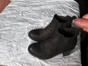 Cumming on her ankle boots