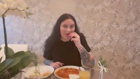 Miss FFW eating cheese pizza and doughballs